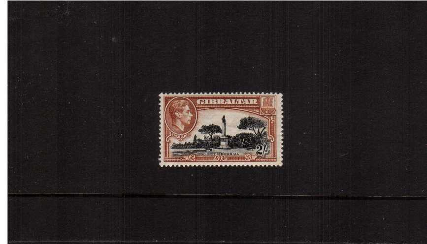 2/- Black and Brown  - Perforation 13. A fine mounted mint single.