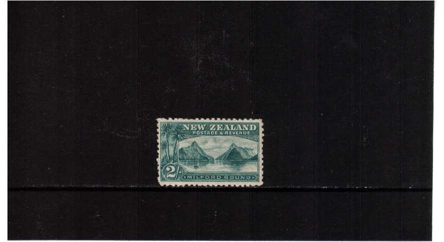 2/- Blue-Green on vertical laid paper lightly mounted mint with excellent perforations and centering for this issue