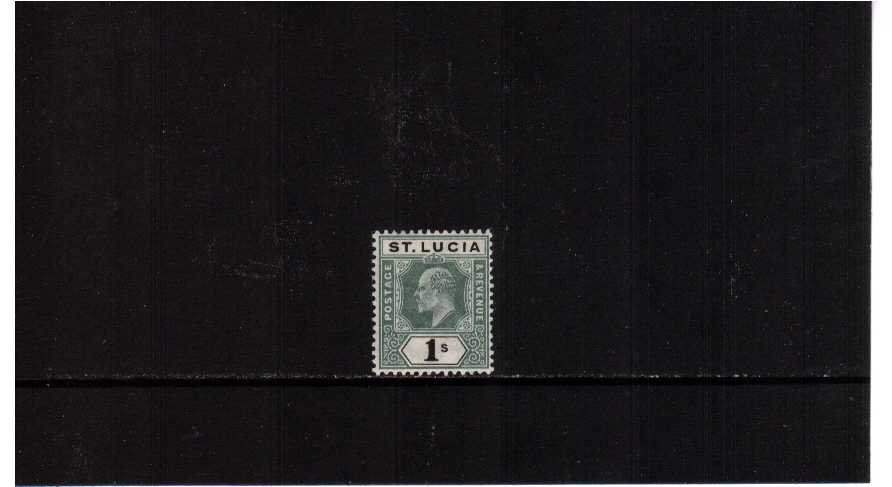 1/- Green and Black lightly mounted mint