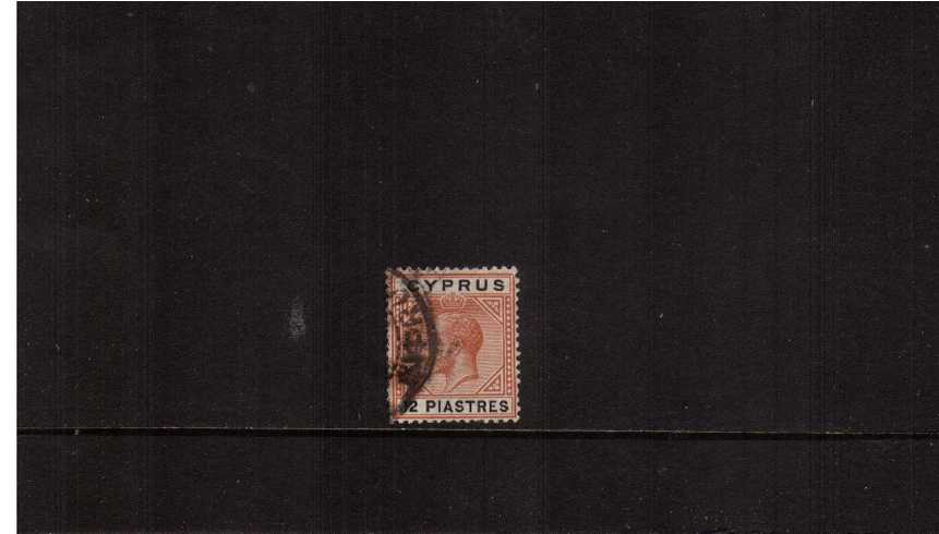 12pi Chestnut and Black - Multiple Crown.<br/>A good fine used single (no missing perfs at left - its the postmark!)