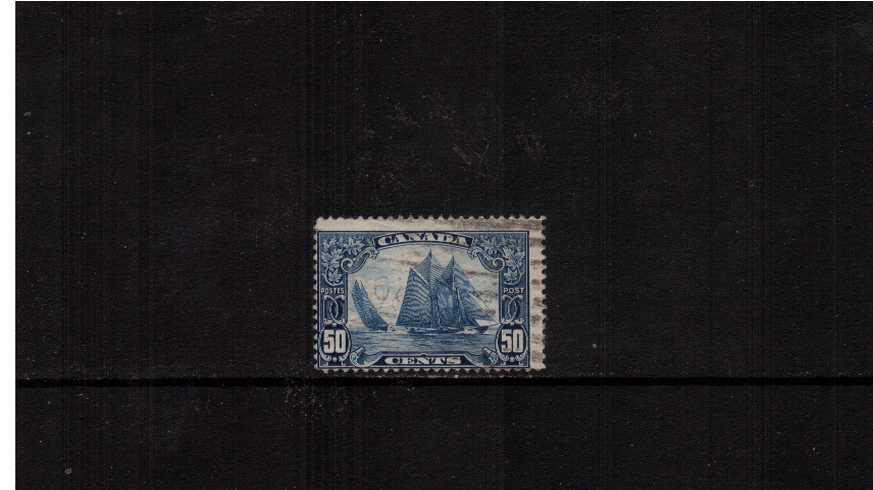 The famous 50c ''Bluenose'' Schooner stamp.<br/>a good used  single with poor centering.
<br/><b>XQX</b>