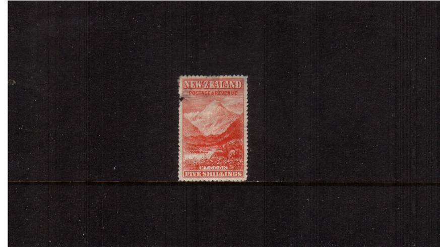 5/- Vermilion<br/>
from the No Watermark Pictorials Set - Perforation 12-16<br/>
A mounted mint single with some damage at left. SG Cat 300<br/>
<br/><b>QSQ</b>