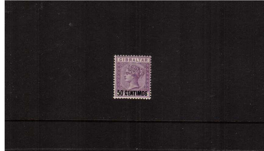 The 50c on 6d Bright Lilac Spanish currency overprint single.<br/>A fine lightly mounted mint single.
