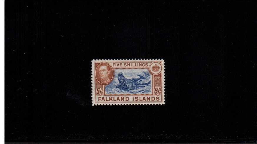 5/- Steel Blue and Buff-Brown on thin paper<br/>
A good looking stamp with excellent centering with blotchy gum and a mere trace of a hinge.
<br/><b>ZFZ</b>