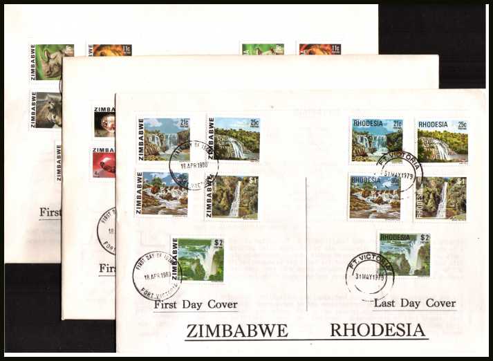 Unusual set of three double covers showing the last day of the RHODESIA set of 15 and the First Day of the ZIMBABWE. Unusual ''Last & First'' 

