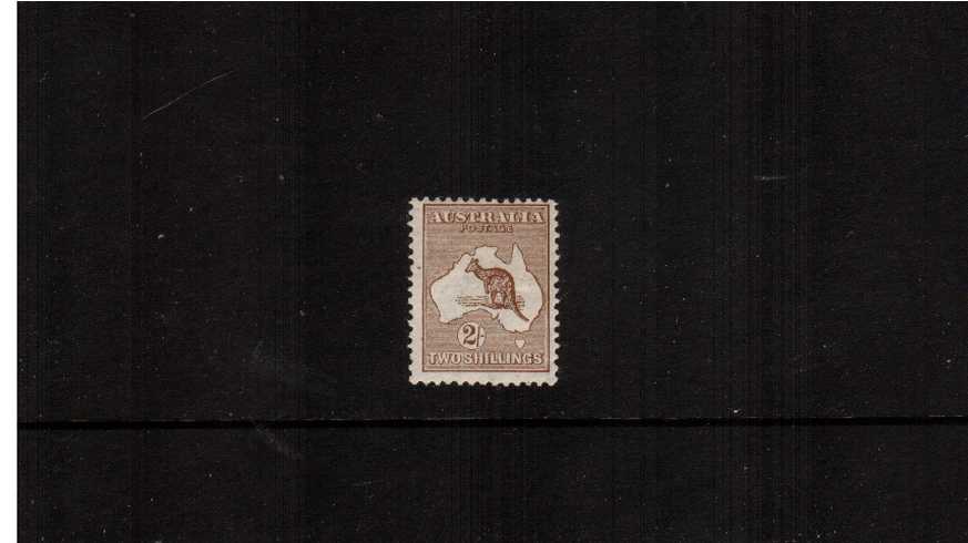 The 2/- Brown - Die II<br/>
A lovely and fresh lightly mounted mint stamp clearly from the first watermark.
<br/><b>ZAZ</b>