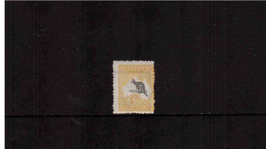 5/- Grey and Yellow - Die II<br/>A very fresh and lightly mounted mint single clearly showing because of the watermark that it was corner of the sheet. Usual very ragged perforations but with nothing missing!