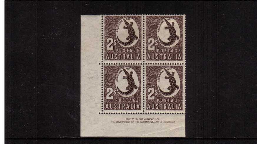 2/- Chocolate ON THIN PAPER in a SW corner imprint block of four lightly mounted
 on the top two stamps and unmounted mint on the lower two.