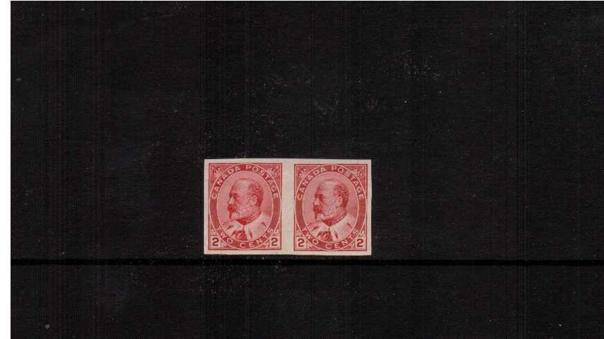 The 2c Pale Rose-Carmine in a very, very lightly mounted mint IMPERFORATE PAIR.<br/>A bright and fresh pair with excellent margins.
<br/><b>XQX</b>