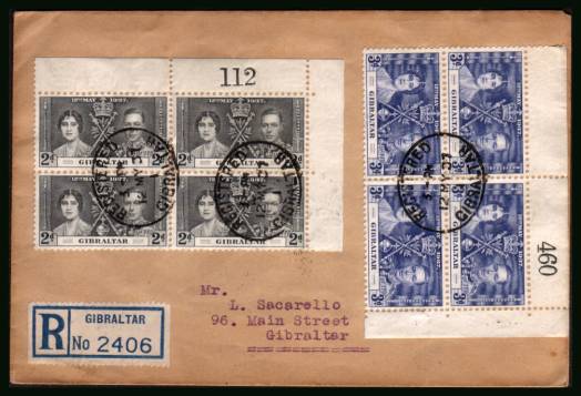 Coronation set of three in matching corner blocks of four <br/>on a plain typed addressed REGISTERED First Day Cover. <br/>Note the d block is on the back of the cover