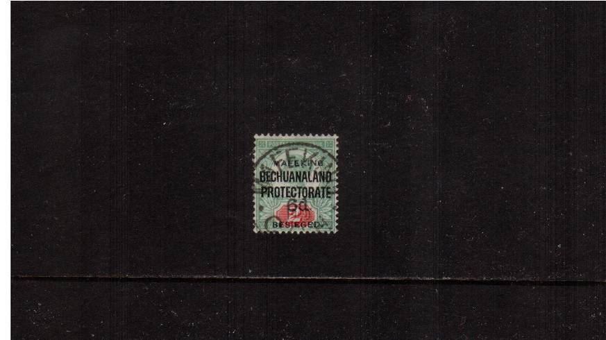 6d on 2d Green and Carmine<br/>
A superb fine used stamp cancelled with part of a MAFEKING - CGH circular date stamp with the benefit of APS certificate stating ''GENUINE''. 

<br/><b>QFQ</b>