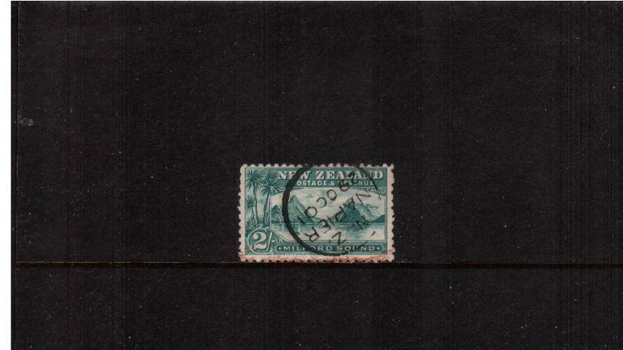 2/- Blue-Green<br/>
from the No Watermark Pictorials Set - Perforation 11<br/>
A superb fine used single (some feint red crayon along bottom edge) cancelled with a NAPIER CDS dated 29 OC 01. SG Cat 55<br/>
<br/><b>QSQ</b>