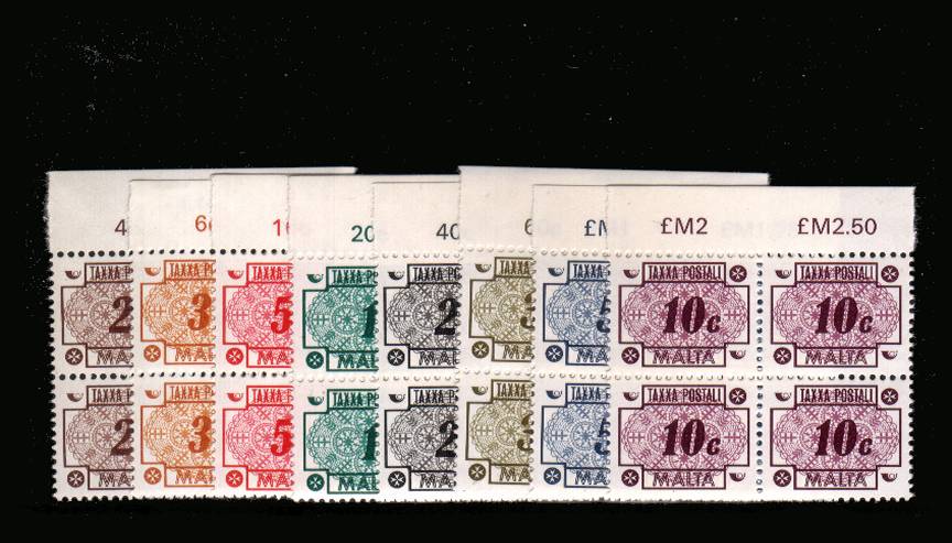 The POSTAGE DUE set of eight in top matginal blocks of four.