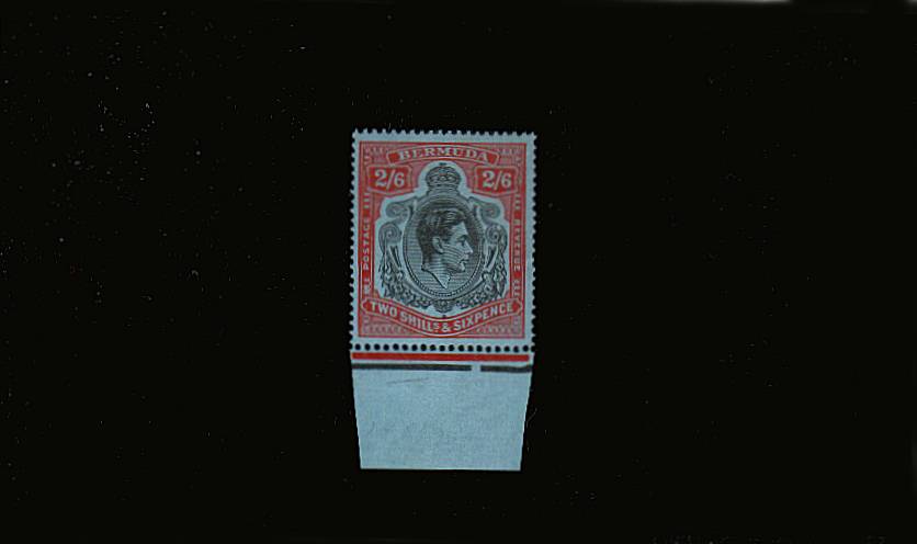 2/6d Black and Red on Grey-Blue - Perforation 14<br/>
A superb unmounted mint lower marginal single<br/>showing <b>Broken Lower Right Scroll</b> on position R5/12<br/>SG Cat �0
<br/><b>QMX</b>