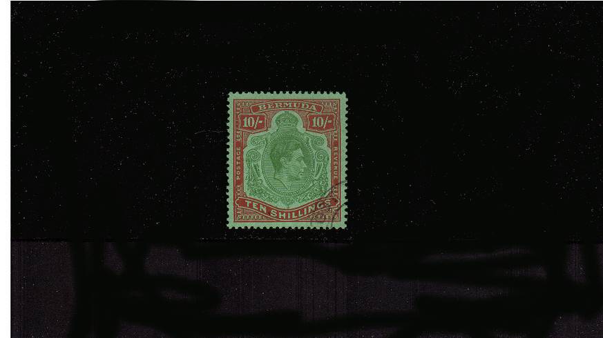 10/- Green and Vermilion on Green - Perforation 13<br/>
A stunning superb fine used single cancelled across the SE corner with part of a double ring CDS. Superb!<br/><b>QPX</b>