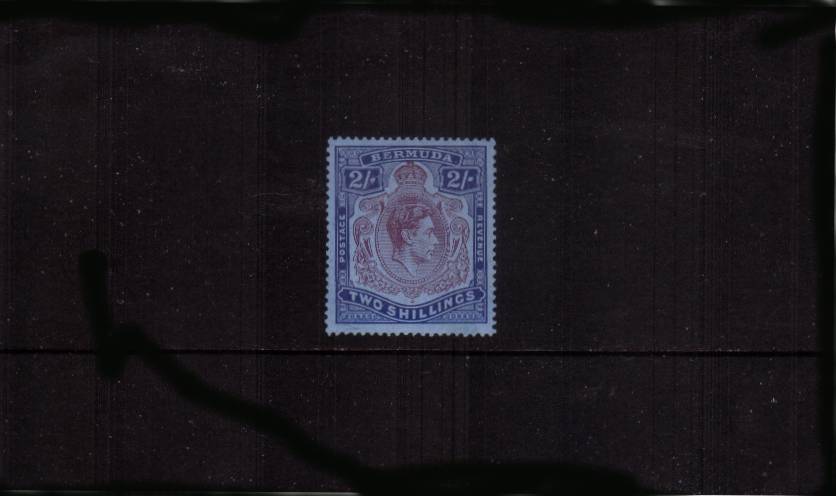 2/- Deep Purple and Ultramarine on Grey-Blue<br/>
A superb very lightly mounted mint single. SG Cat 100<br/><b>QPX</b>