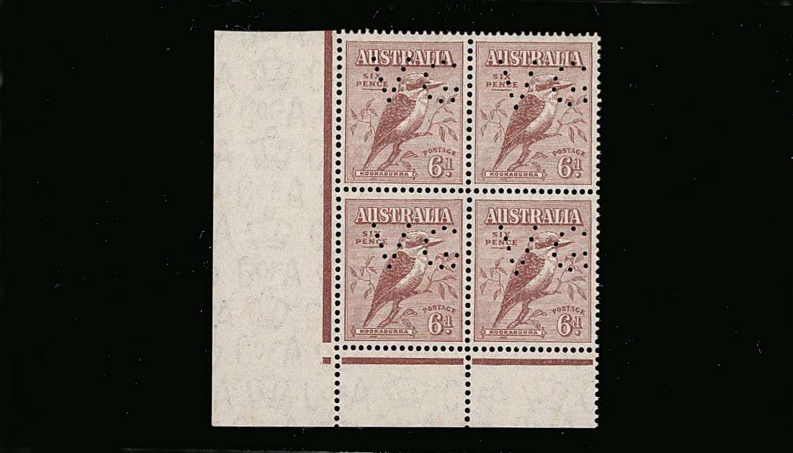 The 6d ''Laughing Kookaburra'' a superb unmounted mint SW corner block of four.  <br/>showing the ''V G'' perfin for the VICTORIA GOVERNMENT.<br/>A scarce pristine block!
<br><b>QQM</b>