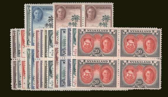 The George Sixth pictorials set of fourteen in superb unmounted mint blocks of four
<br/><b>BBT</b>