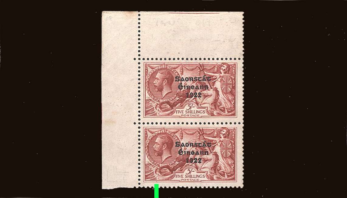 The ''Wide Date'' 5/- Rose-Carmine Seahorse in a superb unmounted  NW vertical pair showing the rare  <b>INVERTED ''T''</b> variety from PL 3A. Listed in the Irish Catalogues but not SG!!! Note: Green line points to variety.<br/><b>A rare variety!
