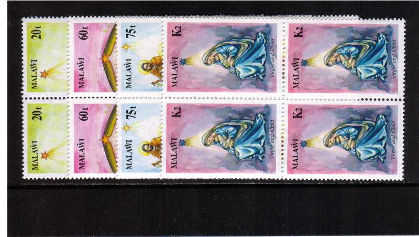 Christmas set of four in superb unmounted mint blocks of four.